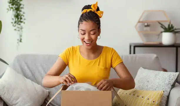 Woman Opening Package
